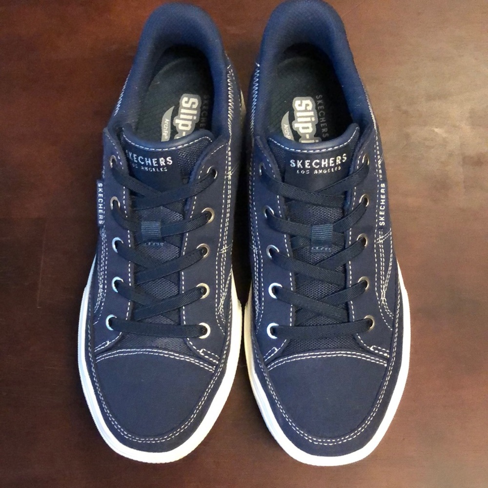 Skechers Women’s Dark Blue Sneakers
Arch Fit Arcade - See Ya There
